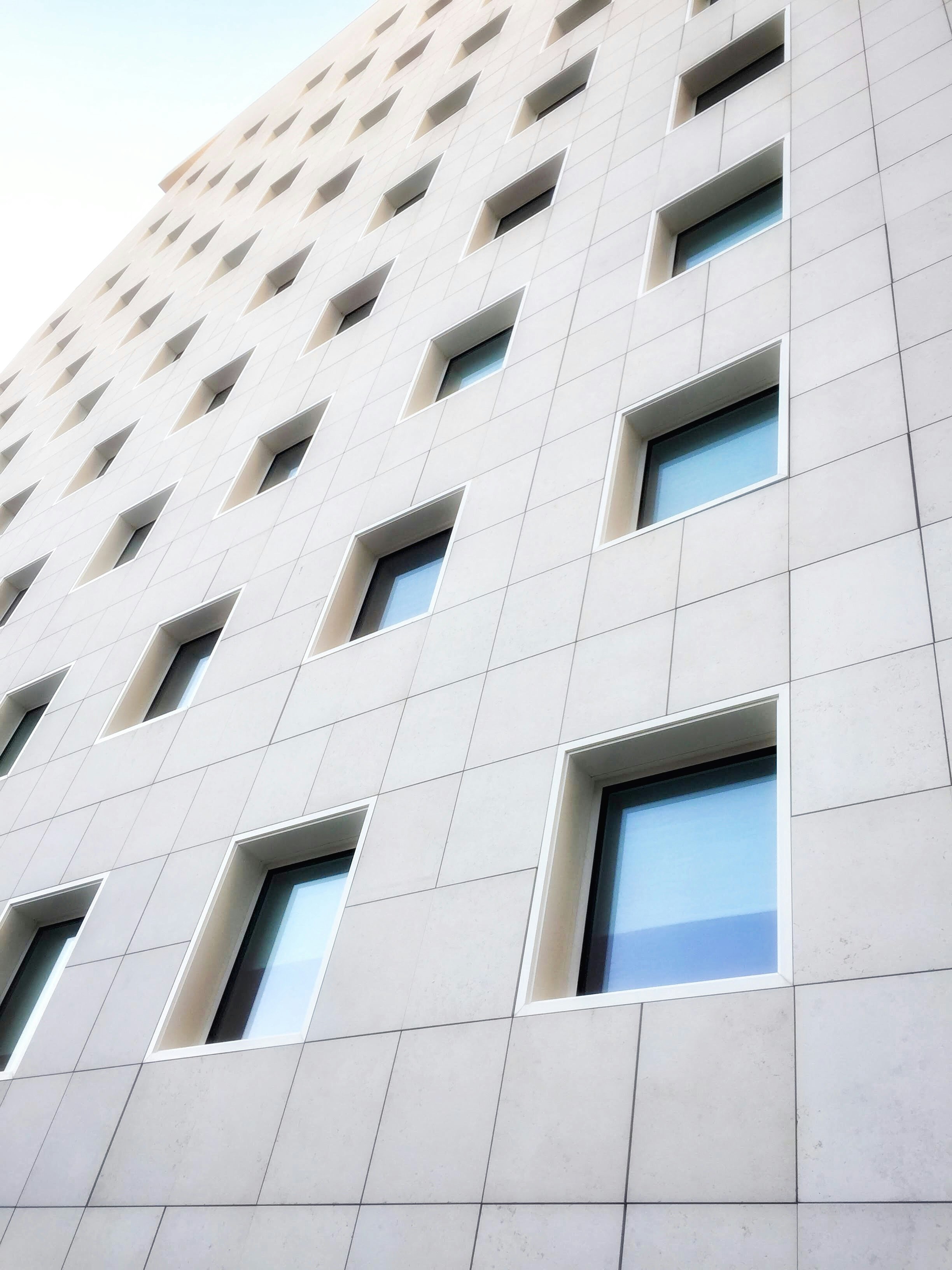 white concrete high-rise building